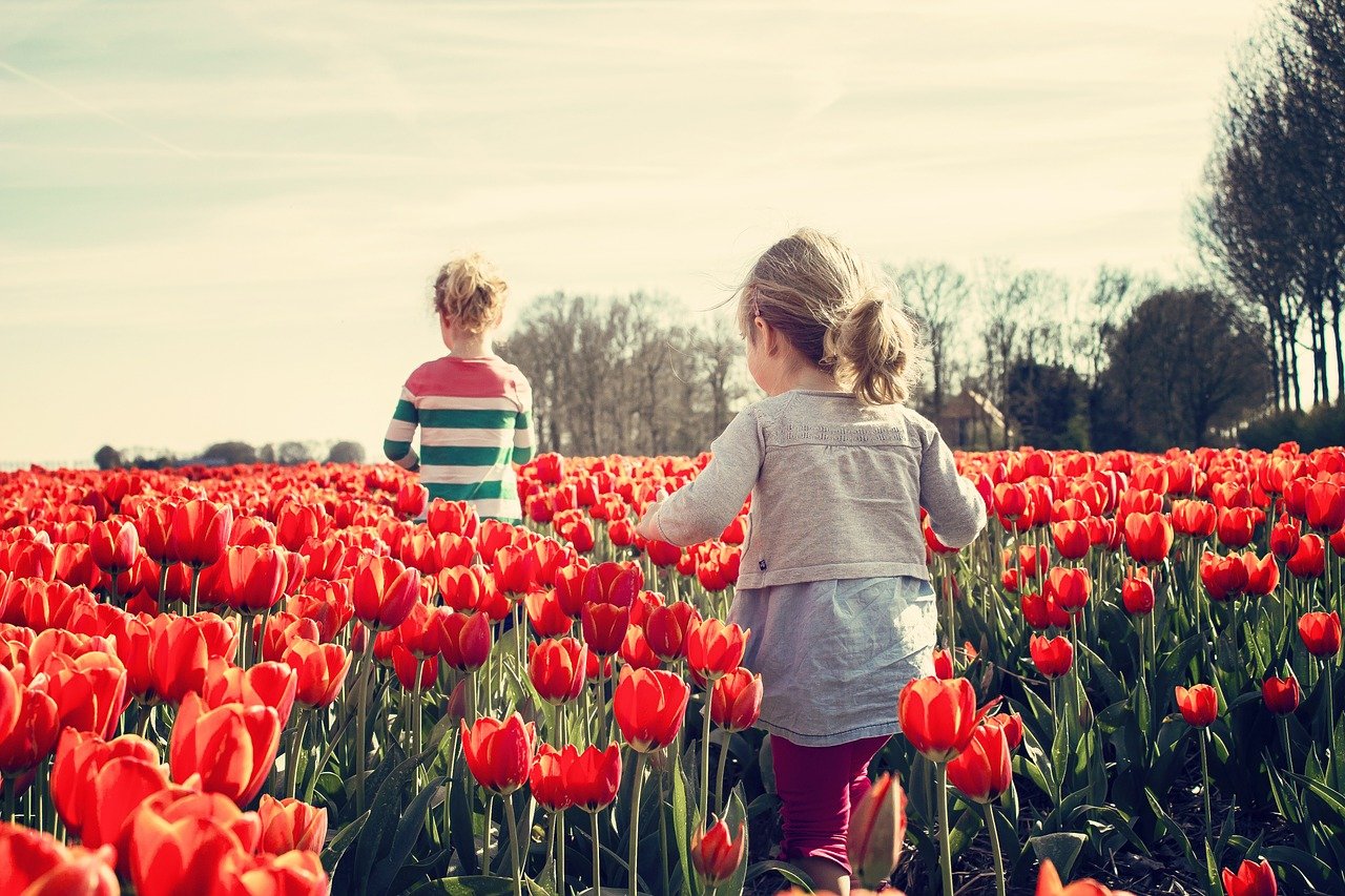 Girls in tulip garden